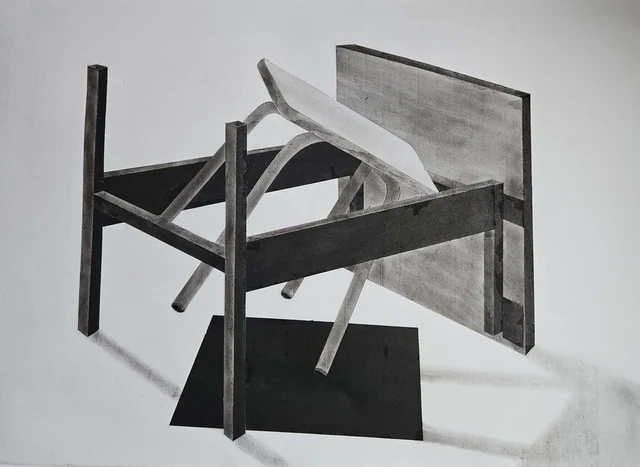 Photograph of a dark wooden chair-like frame with pale pieces and a black base on white